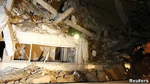  Разбураныя будынкі ў раёне Трыпалі, дзе знаходзіцца рэзідэнцыя Кадафі.