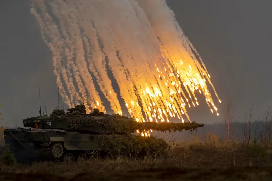 Танк Leopard на вучэннях НАТА ў Літве. Фота: AP Photo/Mindaugas Kulbis
